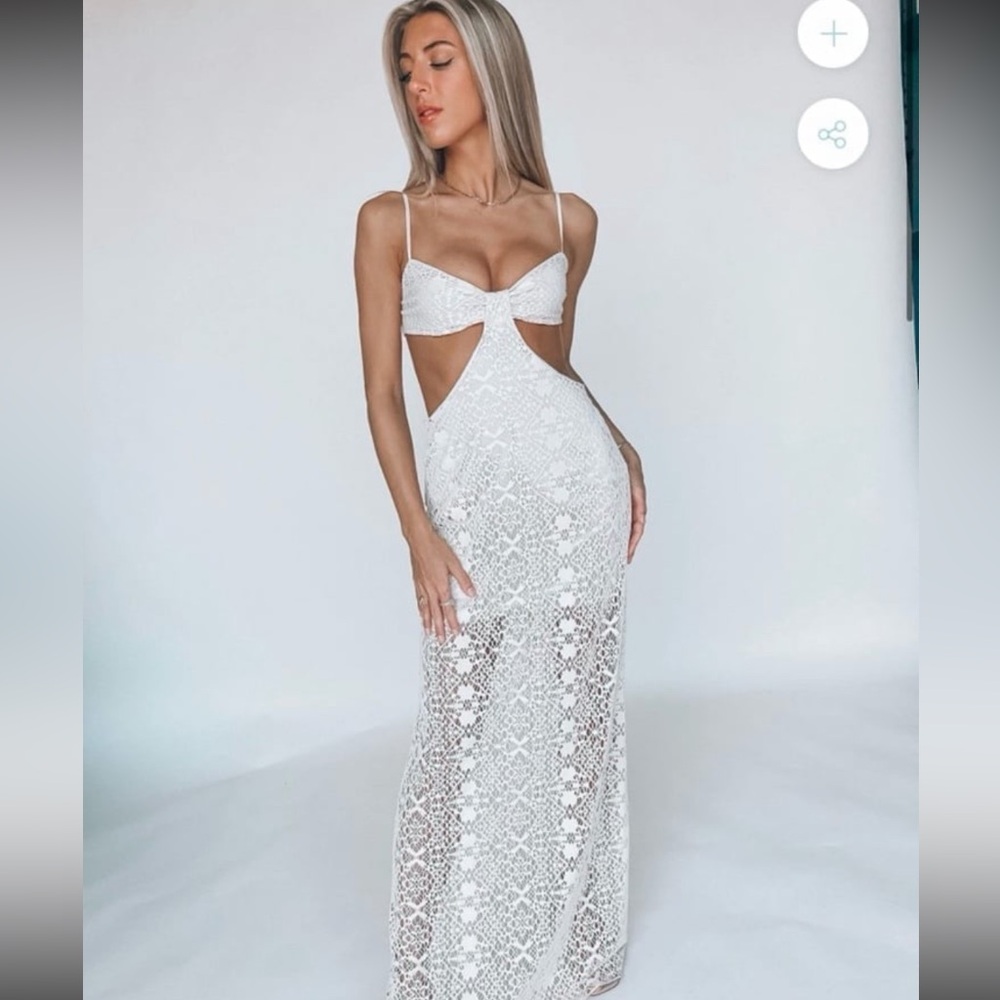 Madida boutique timeless romantic cut out midi dress.